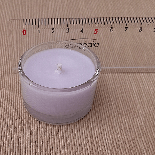 A cute little Lulu Lavender Soy Wax and Lavender votive candle in glass