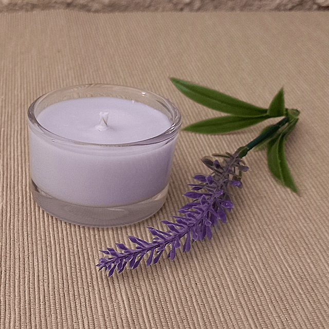 A cute little Lulu Lavender Soy Wax and Lavender votive candle in glass
